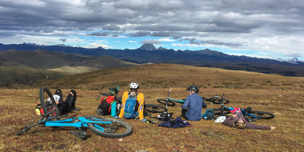 Mountain bikers taking a rest on the Tibetan plateau