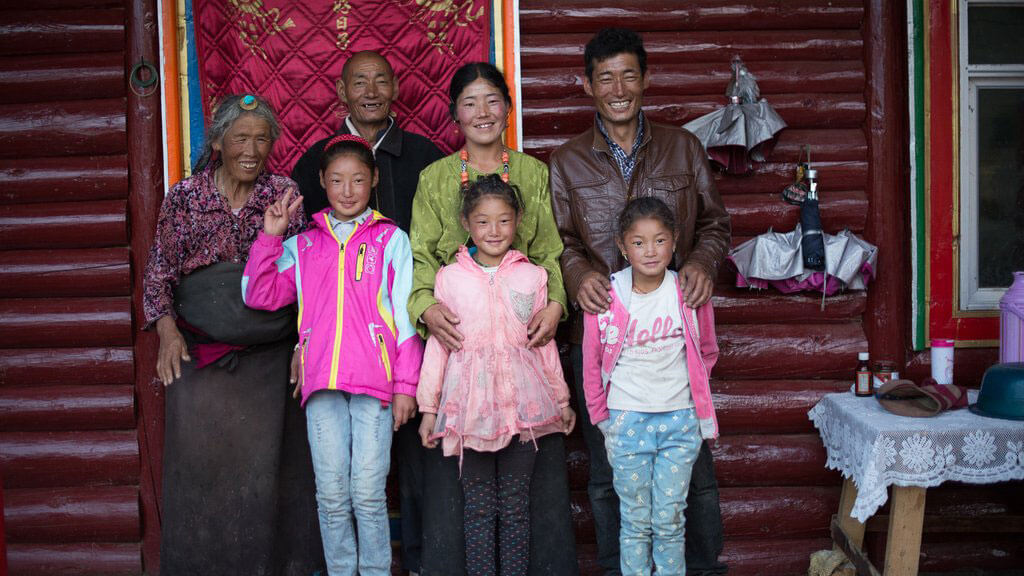 Smiling Tibetan family
