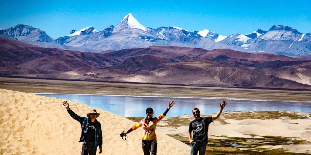 Trekkers at the sand dunes of Lake Namtso